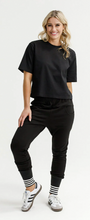 Load image into Gallery viewer, Alpine Apartment pant black w silver X and striped cuff
