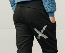 Load image into Gallery viewer, Alpine Apartment pant black w silver X and striped cuff
